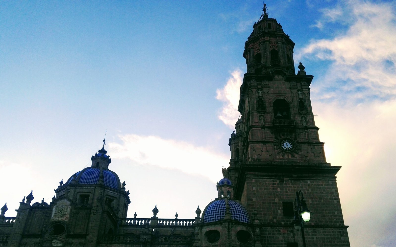 church with round caped roof on two towers
